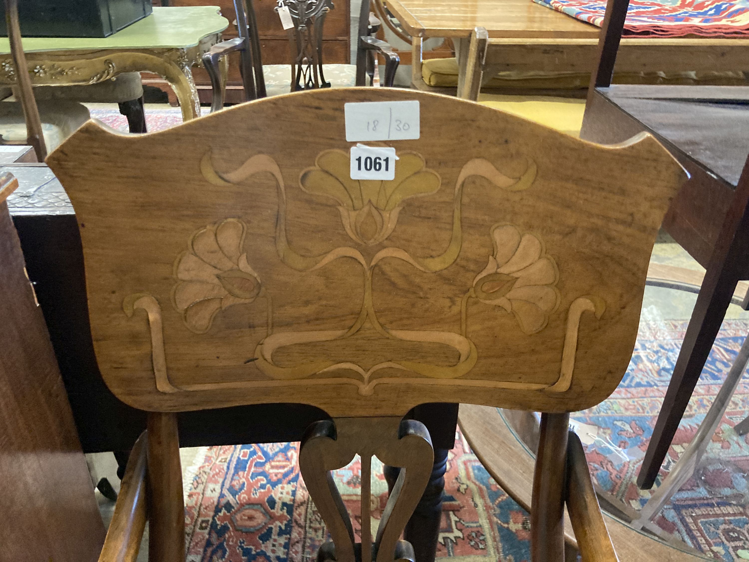 An Art Nouveau marquetry inlaid mahogany and beech elbow chair, width 53cm, depth 54cm, height 104cm